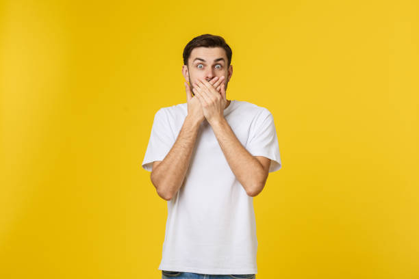 istock young bearded man looking amazed in to the camera 1214726605