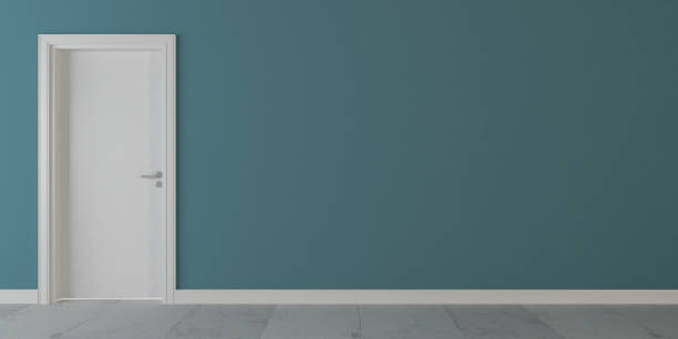 istock White wooden door with blue wall and white stone floor 3D rendering 1214728002