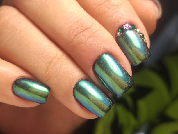 istock stylish design of manicure on beautiful nails 1214729959