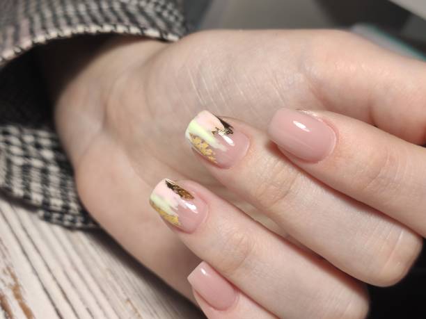istock stylish design of manicure on beautiful nails 1214730271
