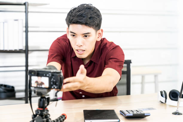 istock Vlogger blogger set up live camera 1214730624