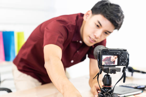 istock Vlogger blogger set up live camera 1214730736