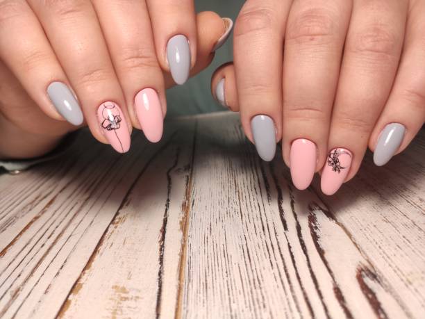 istock sexy pink manicure on long beautiful nails 1214731771
