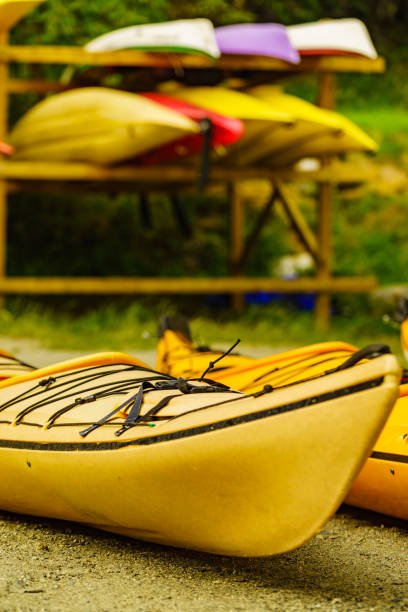 istock Kayaks on water shore. Rental area 1214732478