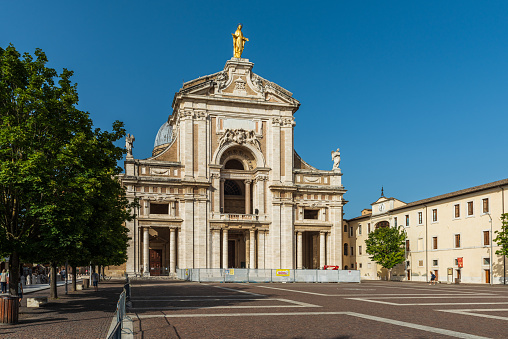 Assisi, Italy - July 22, 2016: Basilica of Santa Maria degli Angeli visited by pilgrims and tourists from all over the world, preserves inside Pardon of Assisi or Portiuncula Indulgence