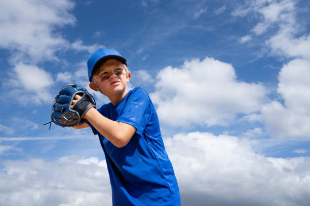 istock Little League Baseball Boy Pitching 1214736906