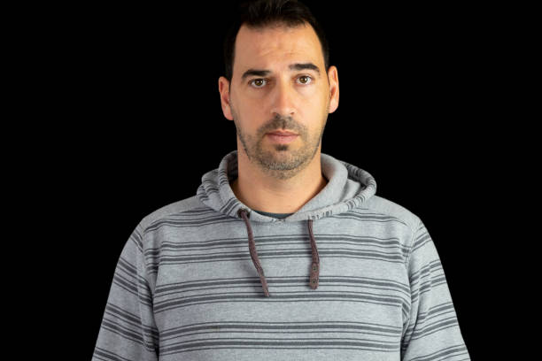 istock Bearded man in a hoodie posing 1214744580