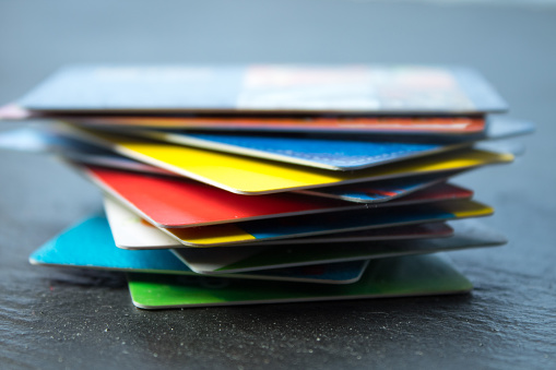 Stack of bank cards on a black background