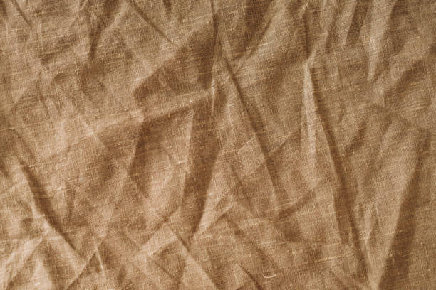 istock crumpled burlap fabric, background and texture of the material 1214745852