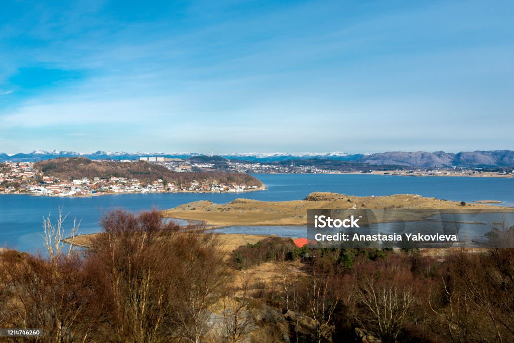 A view of Hafrsfjord fjord from top of the hill in a nice clear sunny spring day A view of Hafrsfjord fjord from top of the hill in a nice clear sunny spring day, Tananger, Norway, March 2018 Bay of Water Stock Photo
