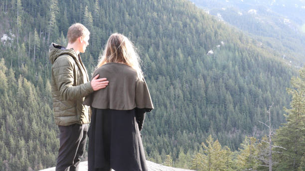 istock Friends walk along mountain ridge 1214746684