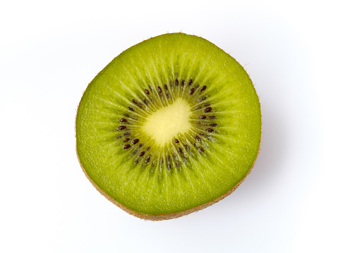 Half kiwi fruit on white background