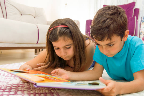 istock Reading a book at home 1214750819