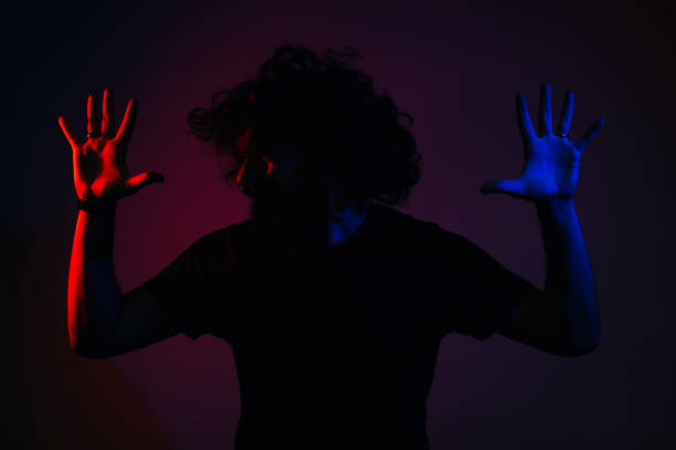 istock Abstract portrait of man doing stop gesture with hands. Man with hands up. STOP CONCEPT 1214752010