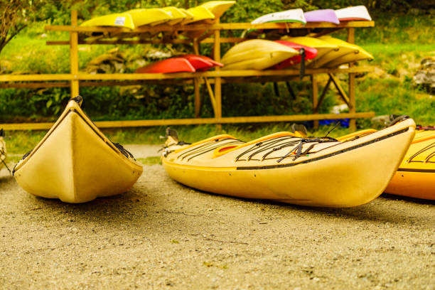 istock Kayaks on water shore. Rental area 1214752452