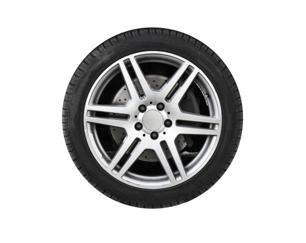 istock Shiny new car wheel isolated on white 1214756255