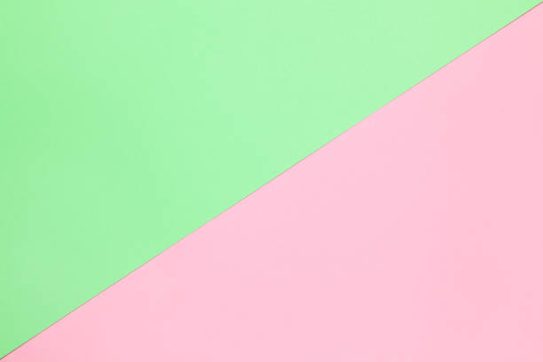 istock Abstract festive spring flat lay. Pastel two-color paper background pink and green, copy space. March 8, February 14, Birthday, St. Valentine's, Mother's, Women's day celebration concept 1214758062