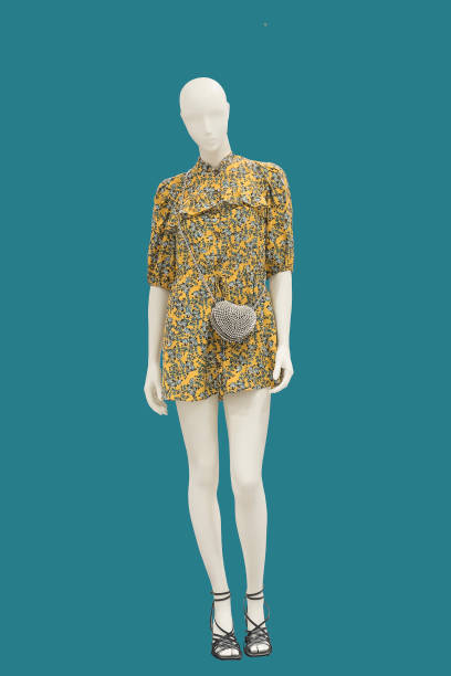 Full length female mannequin. Full length female mannequin dressed in fashionable wear. Isolated on blue background. No brand names or copyright objects. mannequin photos stock pictures, royalty-free photos & images