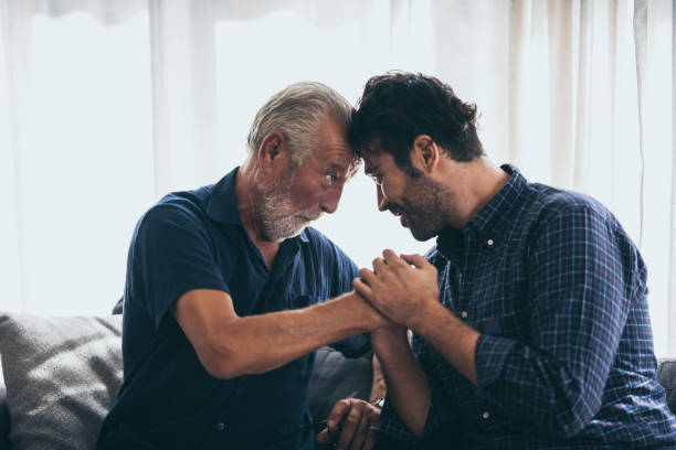 istock Hipster son with his senior father at home. 1214758508