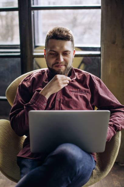 istock Young man working at home because of a coronavirus quarantine 1214759983