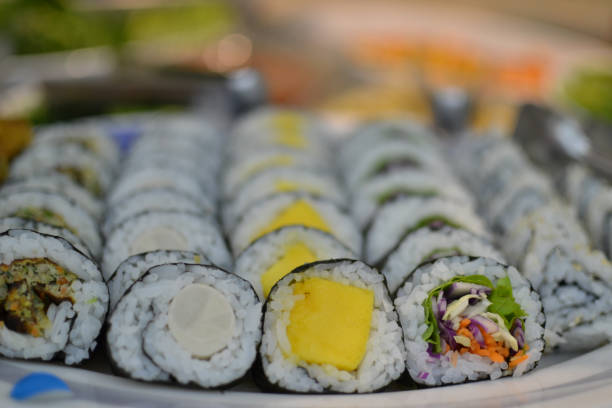 istock vegetarians sushis with mango, salad, palm heart 1214763923