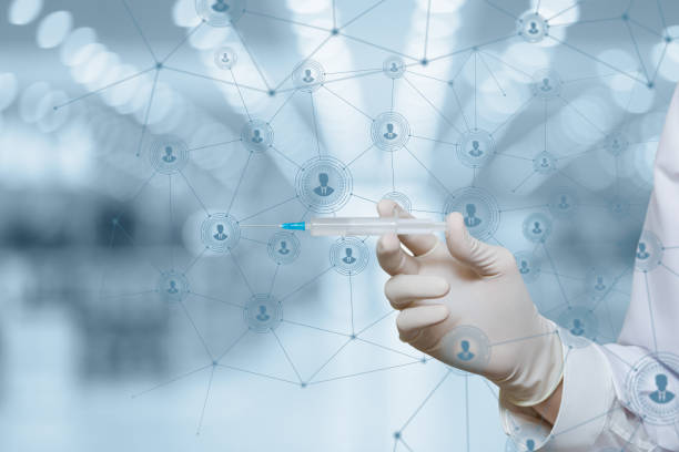 istock A hand in a rubber glove with a syringe . 1214764347