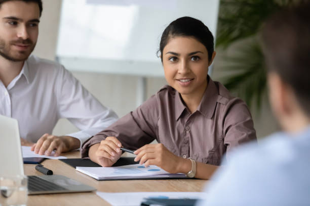 istock Multiracial colleagues brainstorm discussing ideas at meeting 1214766134
