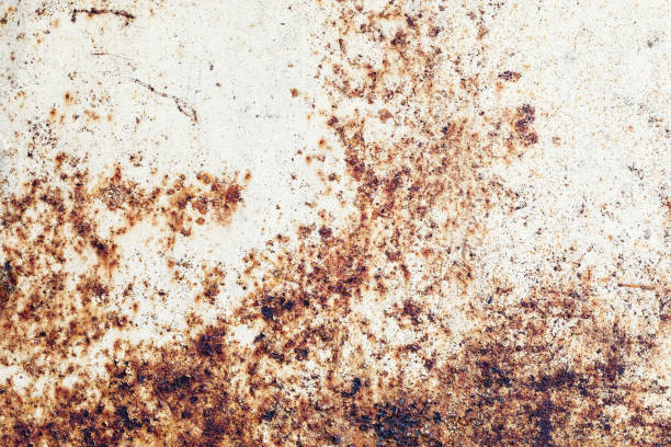 istock Texture of rusty metal with cracked paint, close-up 1214766282