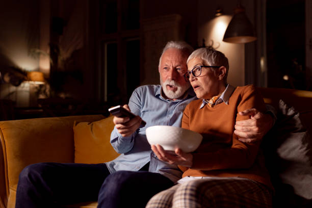 istock Elderly couple spending time together at home 1214768712