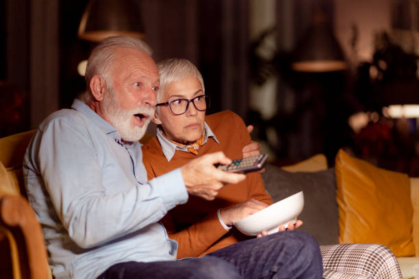 istock Elderly couple spending time together at home 1214768828