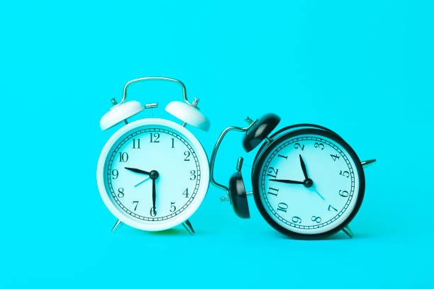istock Time background concept. Vintage classic alarm clock on blue empty background. Time management comcept 1214769401