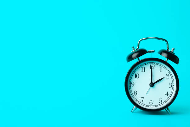 istock Time background concept. Vintage classic alarm clock on blue empty background. Time management comcept 1214769415