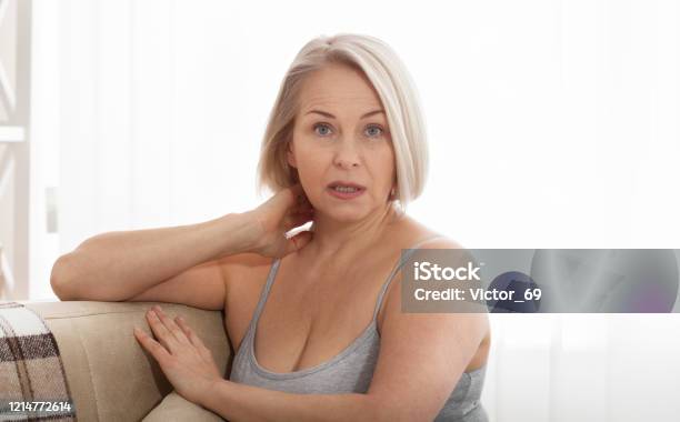 Active Beautiful Middleaged Woman Smiling Friendly And Looking Into The  Camera Woman39s Face Close Up Stock Photo - Download Image Now - iStock