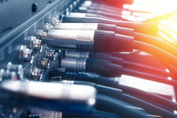 istock Close up audio jacks cable plugged into mixer console. XLR audio cable 1214775388