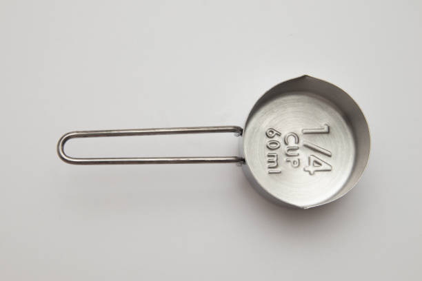 istock Empty Inox Measuring cup. Quarter of Cup or 60 ml. 1214776316