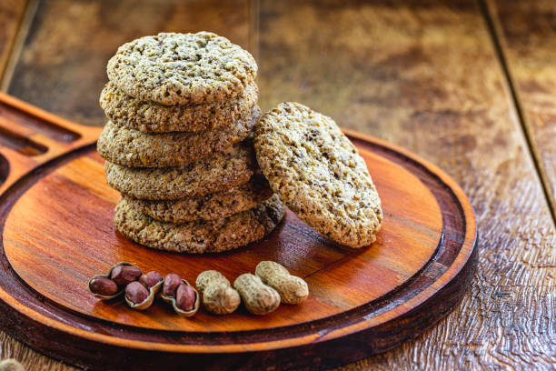 istock Homemade cookies made from organic peanuts. Vegan biscuits on rustic wooden background. 1214778510
