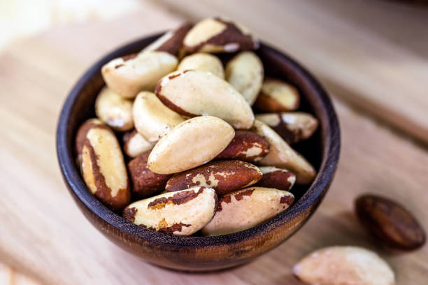 istock Brazil nut, with shell. Culinary ingredient from brazil. 1214779590