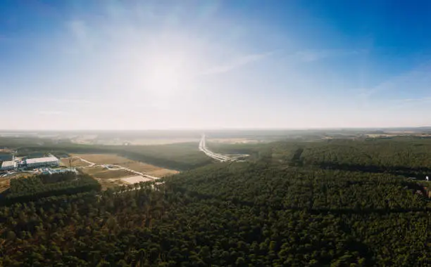 wideangle aerial drone photo with panorama of the forest of Grunheide, Berlin-Brandenburg place for the new Tesla Gigafactory Europe