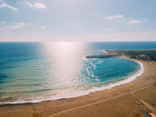 istock A sandy beach next to a body of water 1214785307