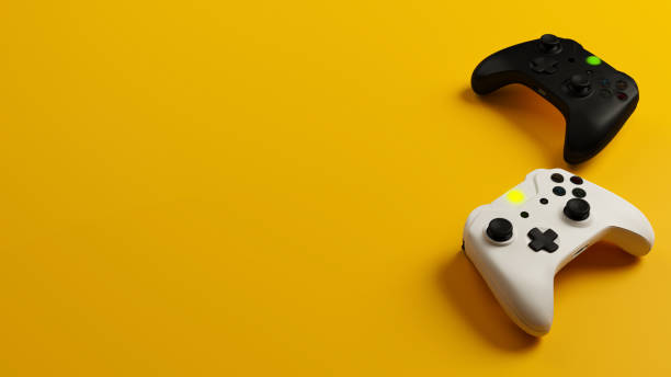 istock Game competition. White and black joystick with yellow background 3D rendering 1214786475
