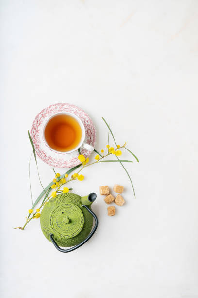 istock Cup of herbal tea. Mimosa branch decoration. 1214786801