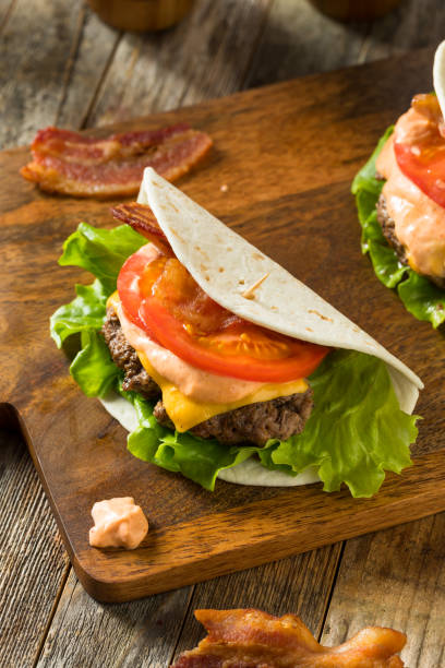 istock Homemade Cheeseburger Taco in a Tortilla 1214789257
