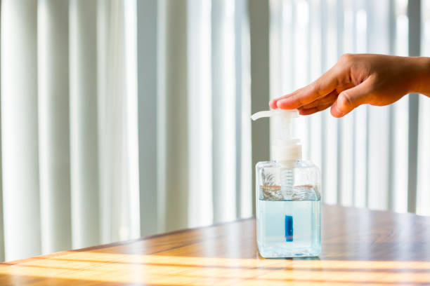 istock Washing hands with alcohol sanitizer to avoid contamination with Coronavirus Covid-19. 1214791326