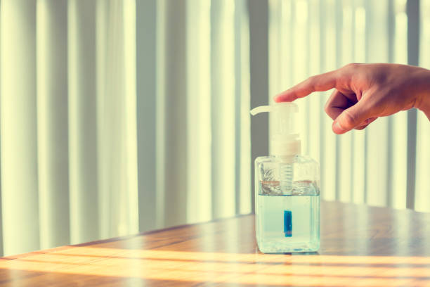 istock Washing hands with alcohol sanitizer to avoid contamination with Coronavirus Covid-19. 1214791332