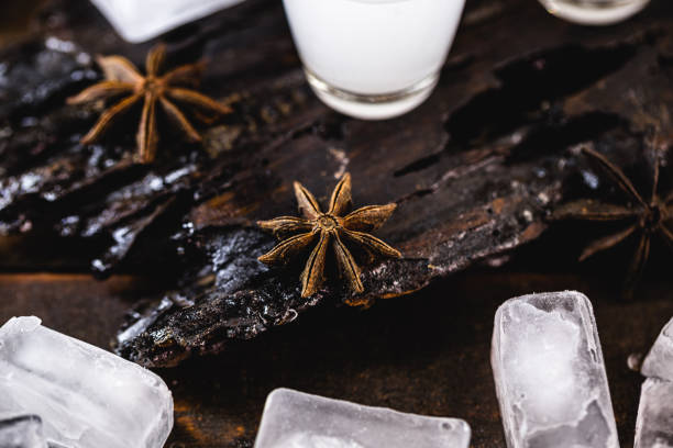 istock Traditional arabic alcohol drinks Raki with anise, rustic wooden background with space for text. 1214794462