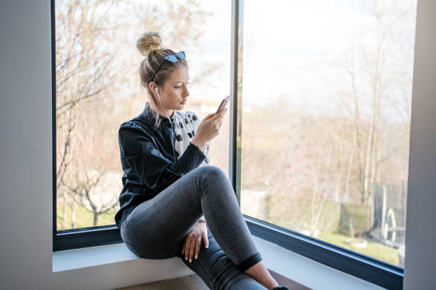 istock She is killing her time scrolling through social media in home isolation 1214794513