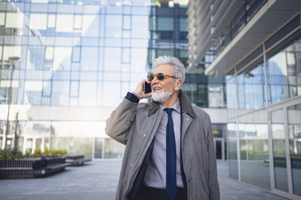 istock Succesful modern senior businessman on a business call 1214797220