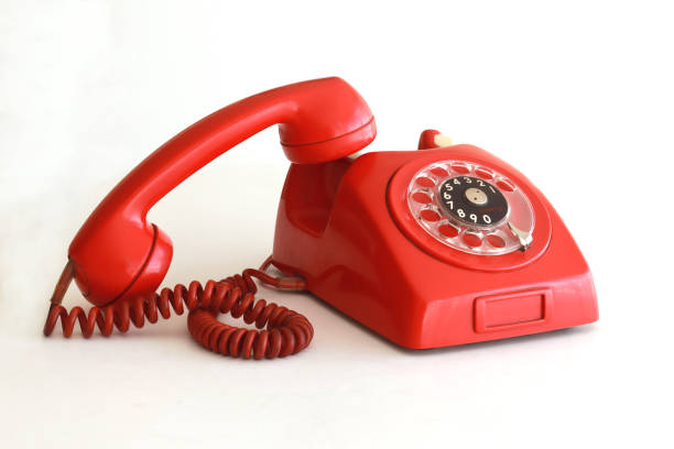 istock Vintage red telephone and its handset 1214803823