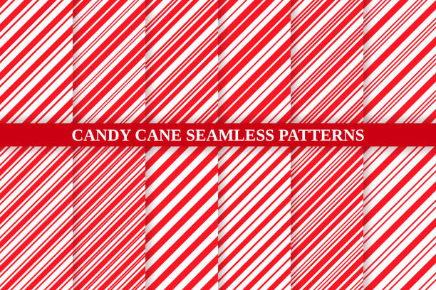 Candy cane seamless pattern. Christmas stripe background. Vector illustration. Candy cane striped pattern. Seamless Christmas red background. Vector. Peppermint wrapping texture. Set cute caramel package prints. Xmas holiday diagonal lines. Abstract geometric illustration. candy cane striped stock illustrations