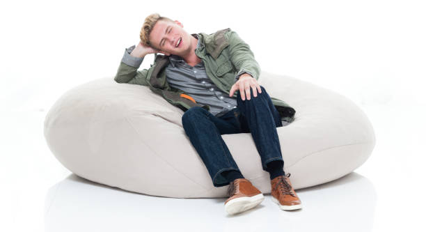 istock Caucasian boys in front of white background wearing pants 1214823593